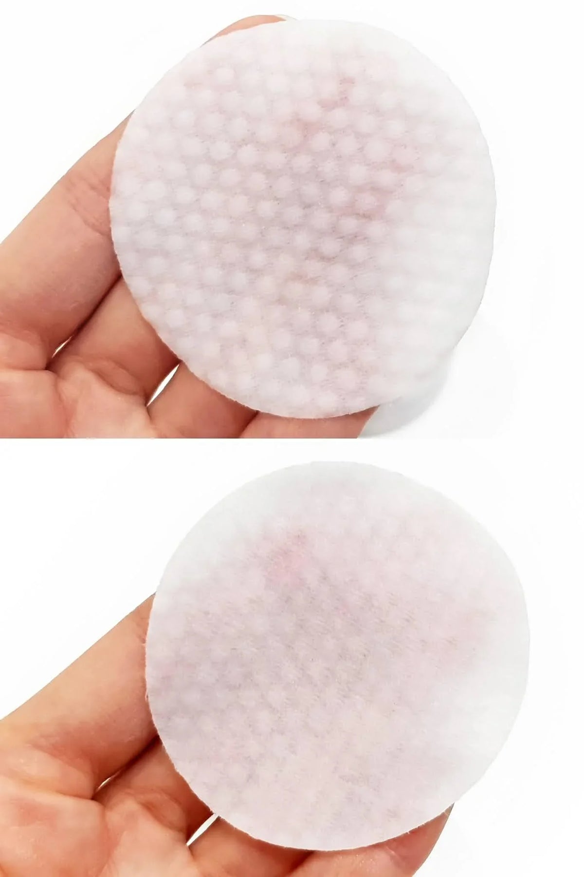 Two Medicube Zero Pore Pads 2.0 exfoliating toner pads held in a hand.