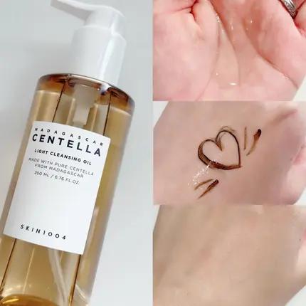 SKIN1004 Madagascar Centella Light Cleansing Oil bottle and texture swatch on skin.